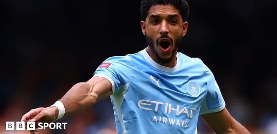 Joueur de Manchester City célébrant un action de jeu