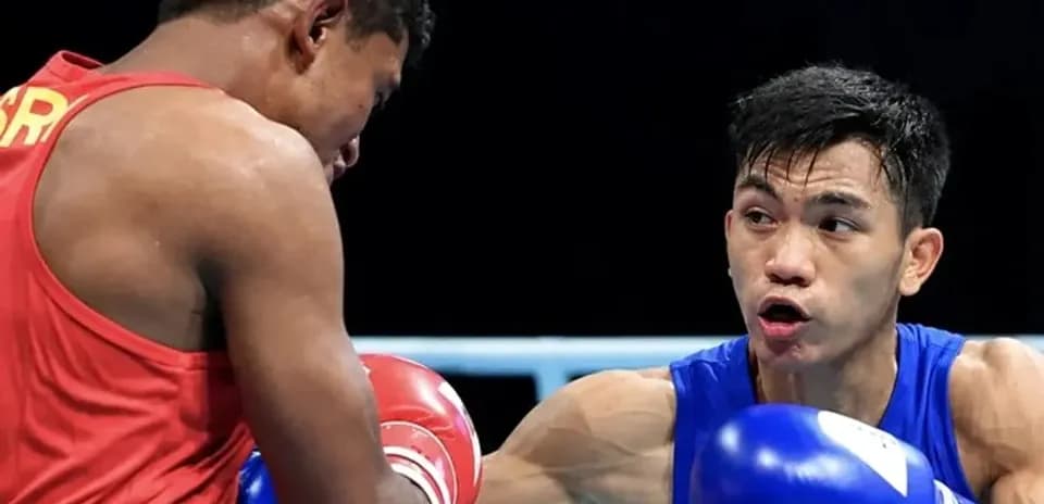 Deux boxeurs s'affrontant sur le ring