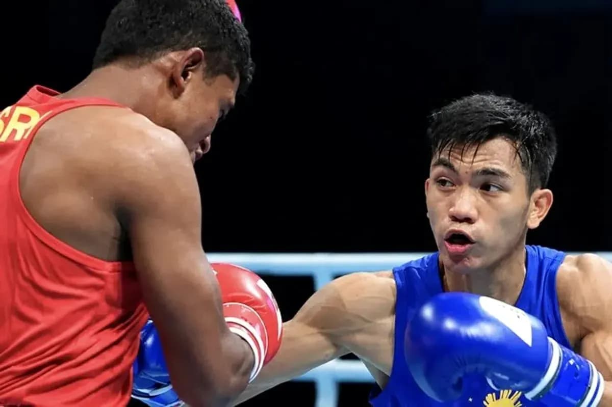 Deux boxeurs s'affrontant sur le ring