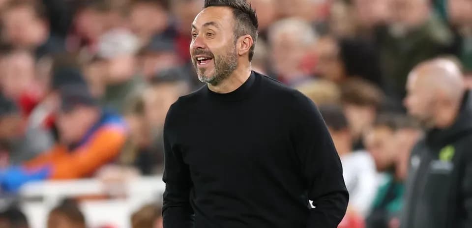Entraîneur sur le banc lors d'un match