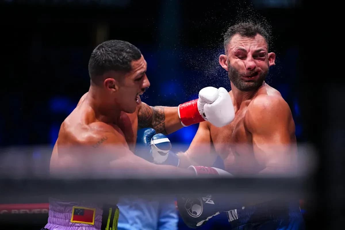 Boxers exchanging punches during a match
