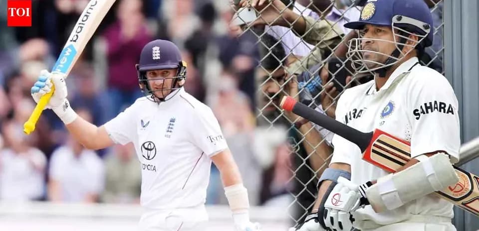 Batsman celebrating while another waits to bat