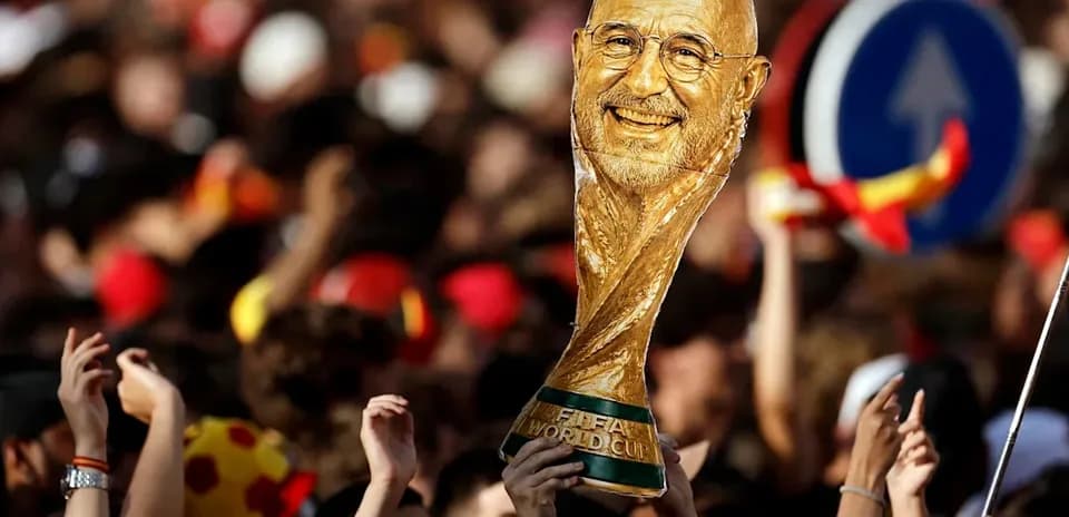 Supporters celebrating with a FIFA World Cup trophy