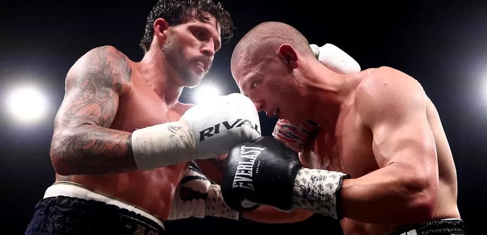 Deux boxeurs s'affrontant sur le ring