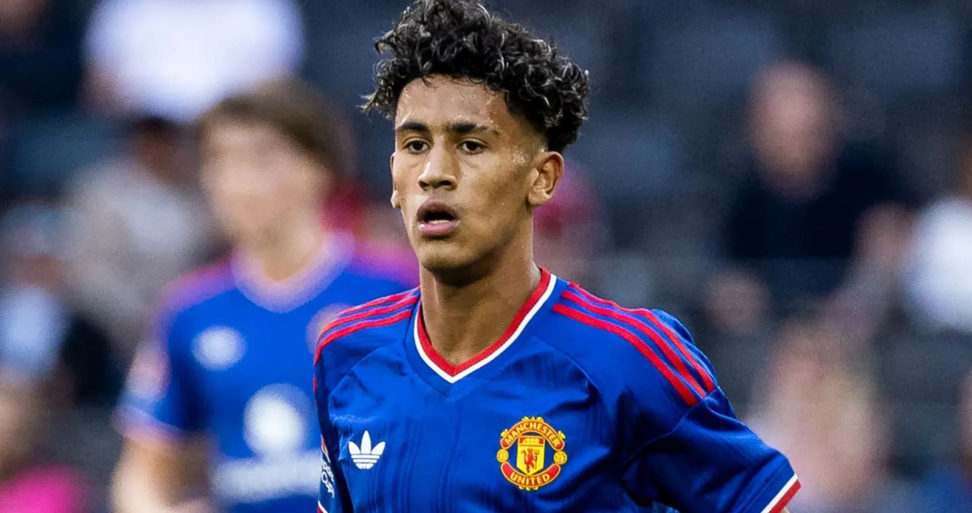 Joueur de Manchester United en action sur le terrain