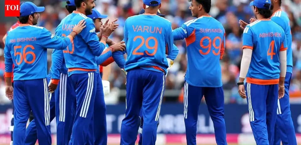 Équipe de cricket célébrant un wicket sur le terrain