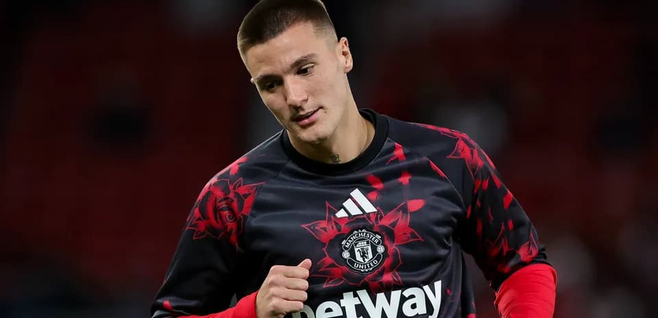 Joueur de Manchester United en échauffement avant le match