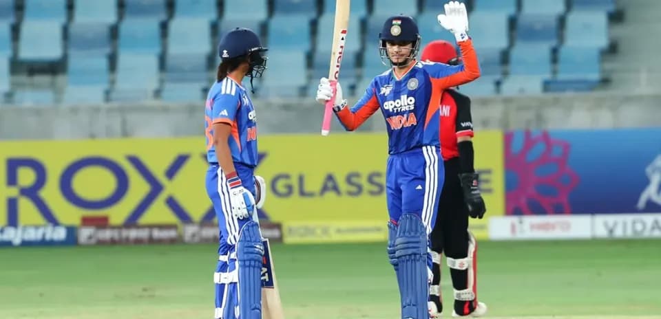 Joueurs indiens célébrant un point au cricket