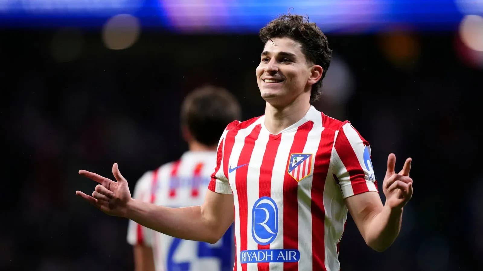 Joueur d'Atlético de Madrid célébrant un but