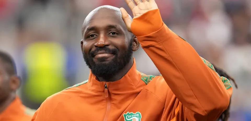 Joueur saluant le public avant le match