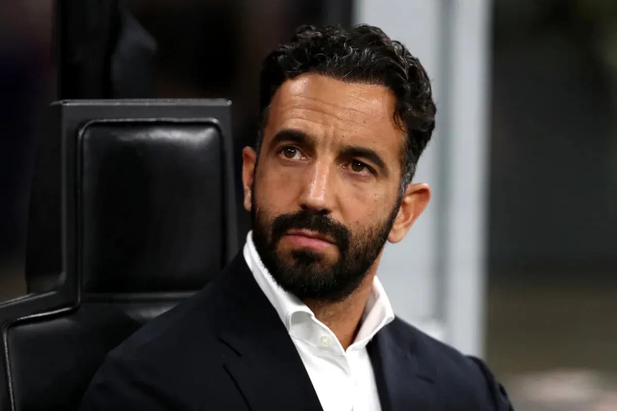 Entraîneur assis sur le banc de touche