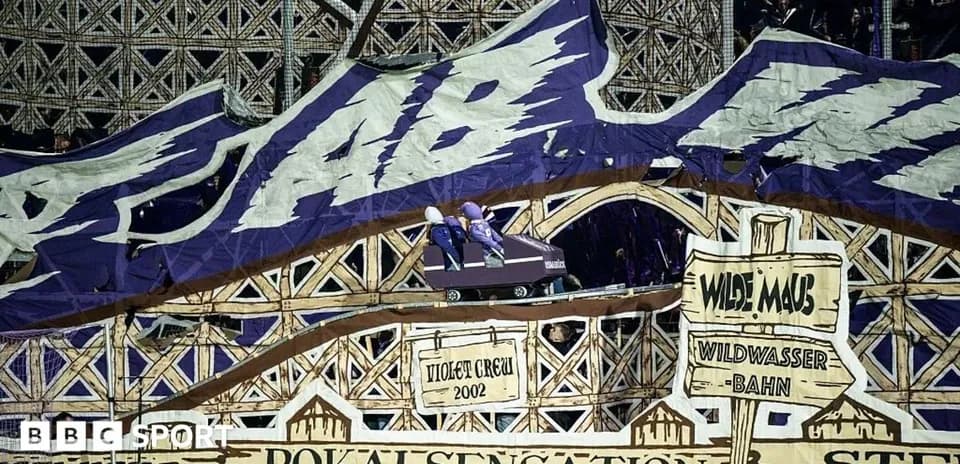 Tifo display featuring a roller coaster theme