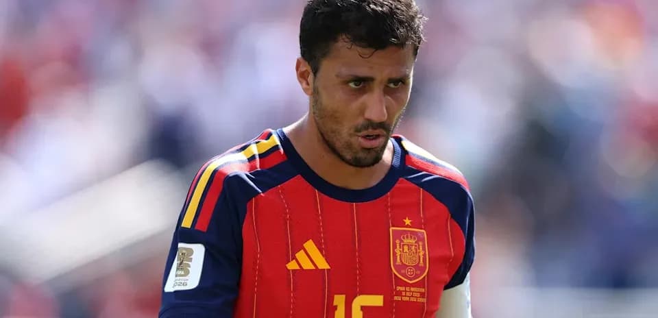 Joueur espagnol en maillot rouge lors d'un match
