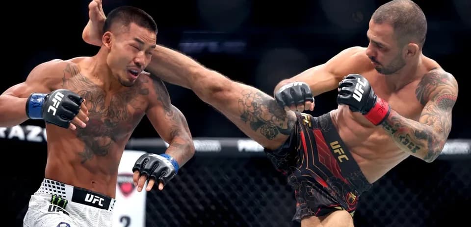 Combatants exchanging strikes during UFC match
