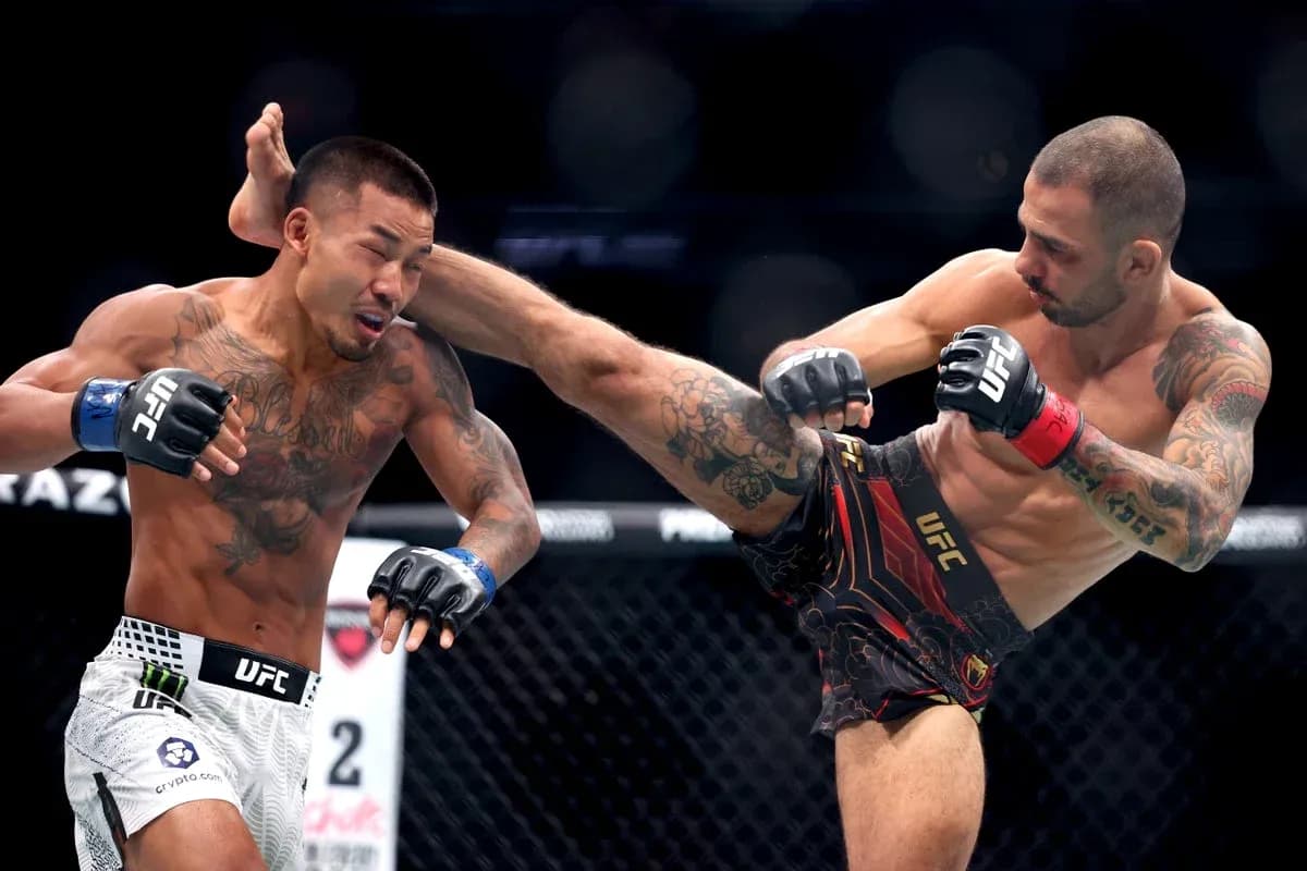 Combatants exchanging strikes during UFC match