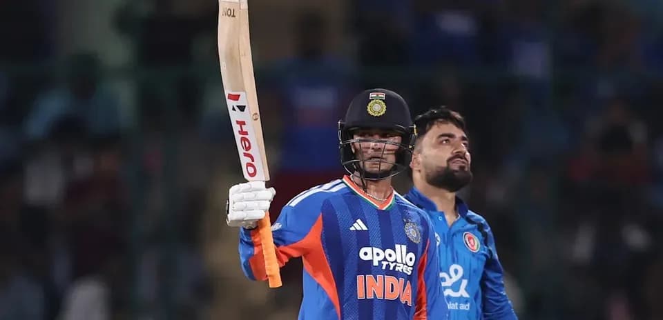 Batsman celebrating a run during cricket match