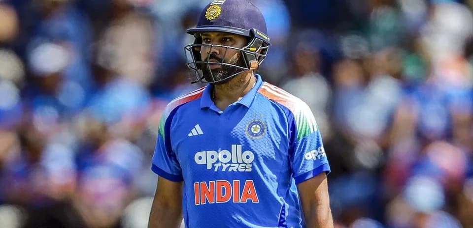 Rohit Sharma in blue India jersey during match
