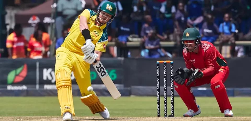 Batsman hitting the ball during cricket match