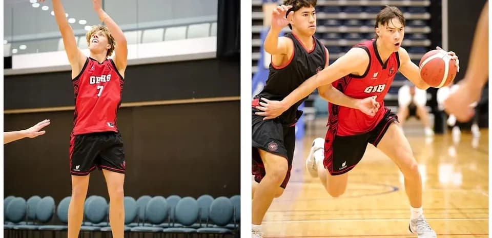 Joueur tirant au basket, autre joueur en défense
