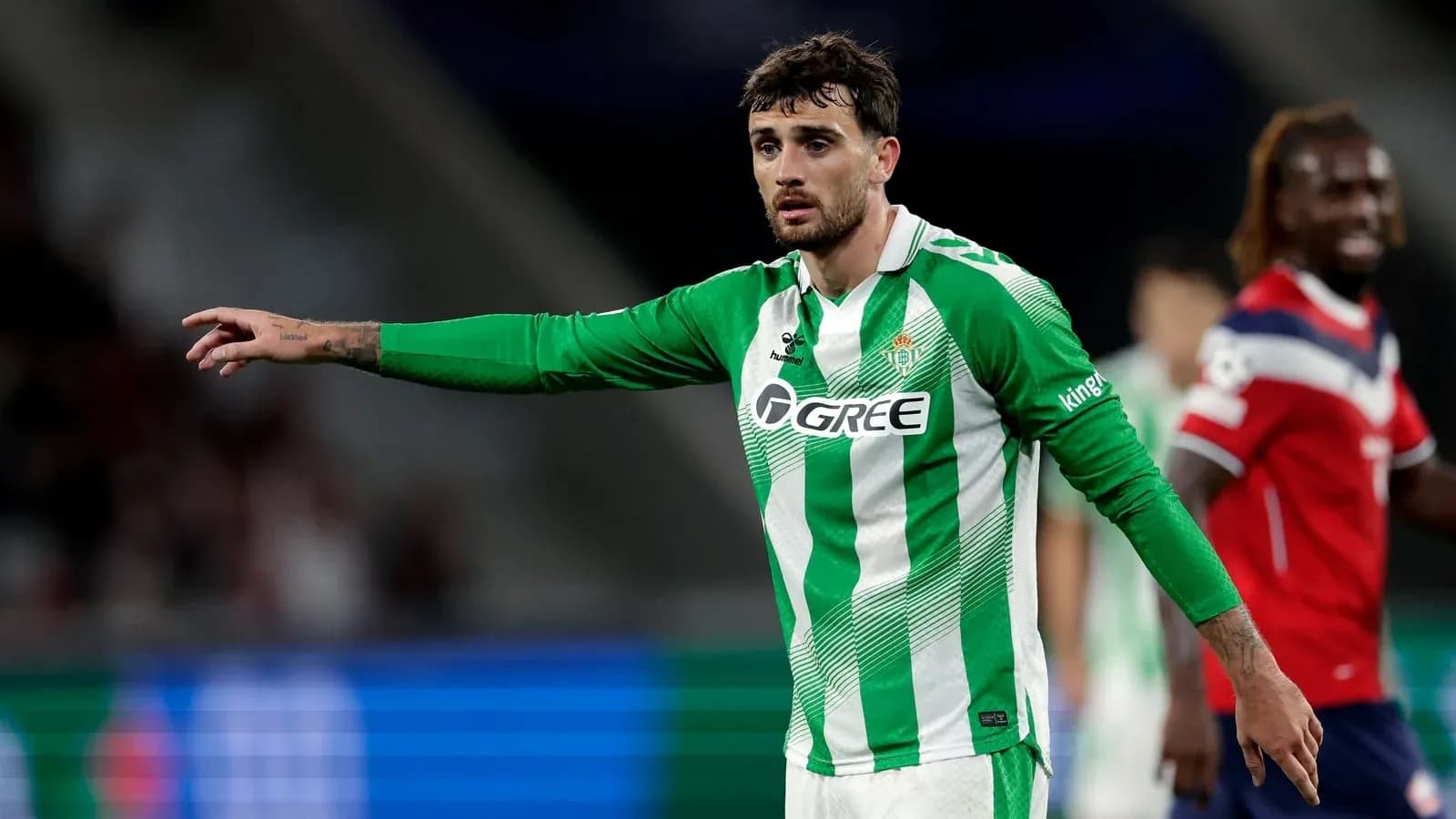 Joueur de Betis en action sur le terrain