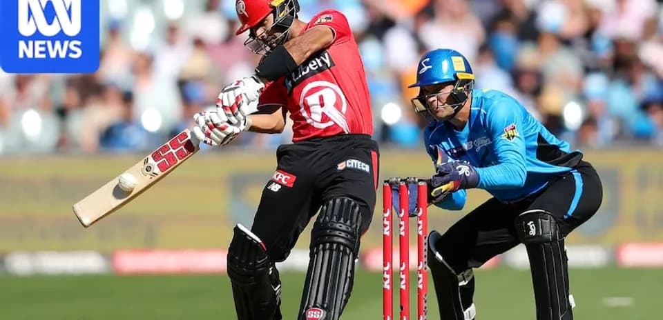 Batsman hitting the ball with wicketkeeper behind
