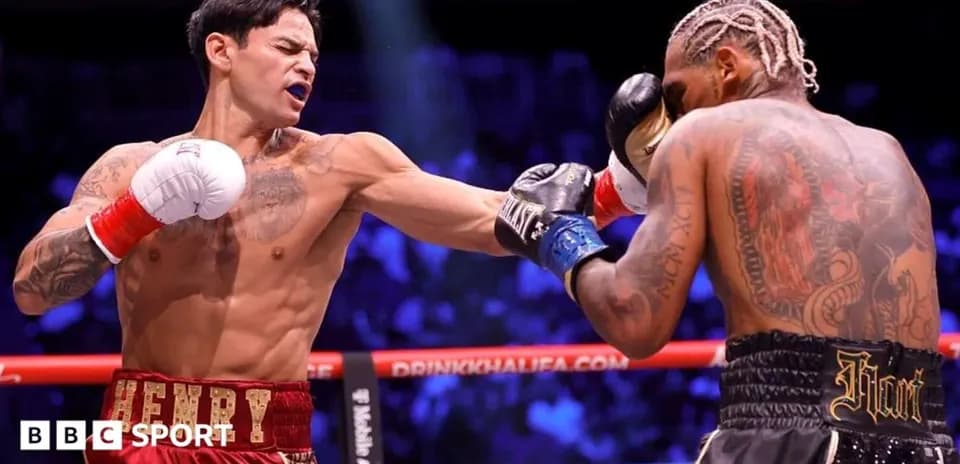 Boxer throwing a punch during a match