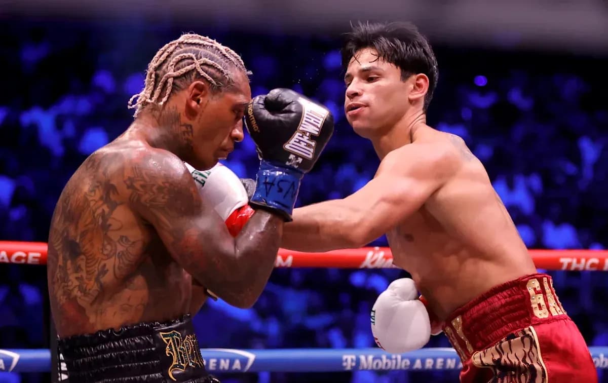 Deux boxeurs se battant dans le ring