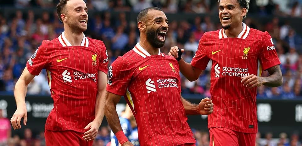 Joueurs de Liverpool célébrant un but