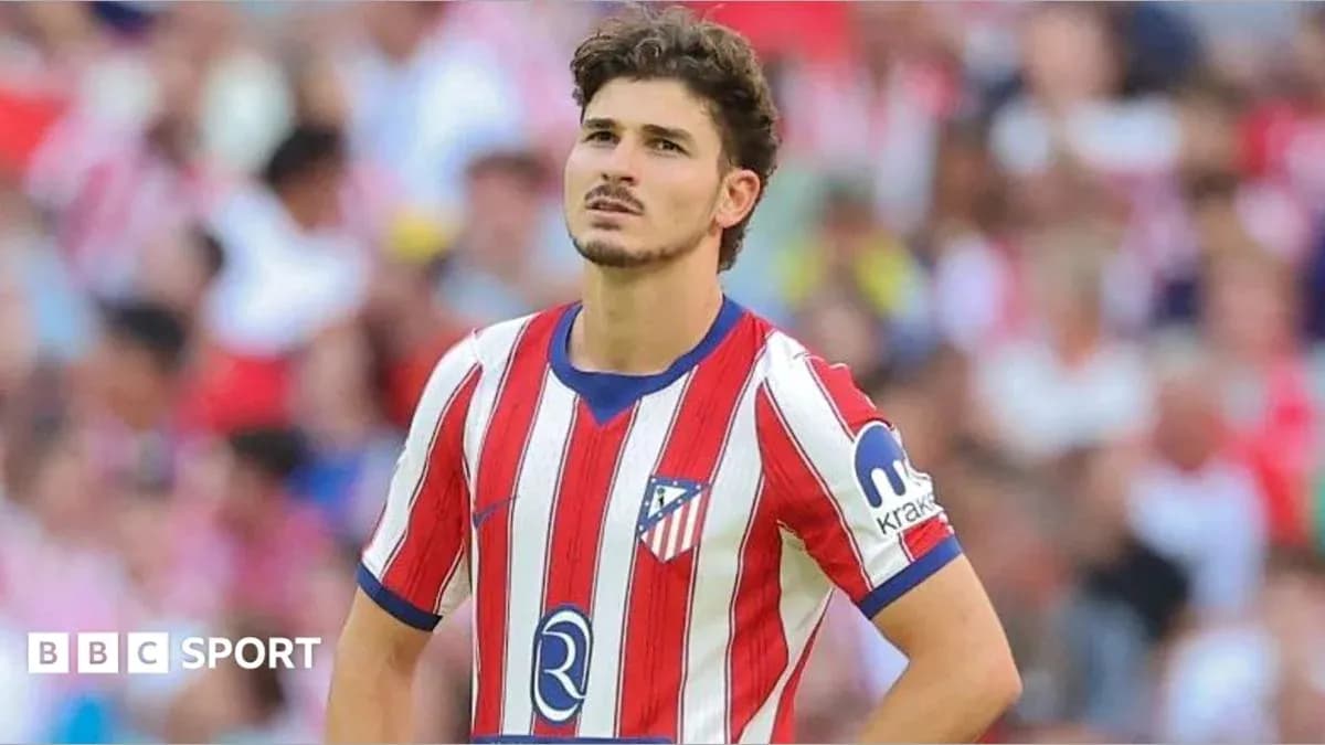 Joueur d'Atlético de Madrid sur le terrain