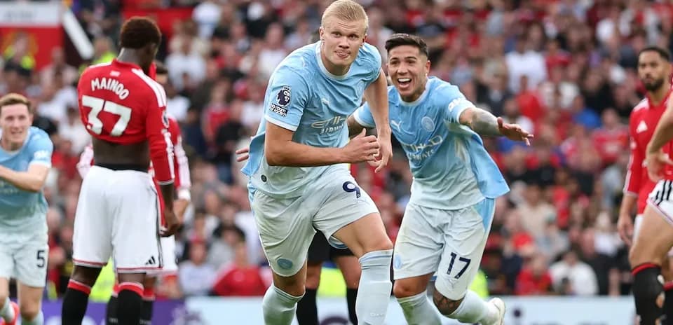 Erling Haaland celebrating goal with teammates