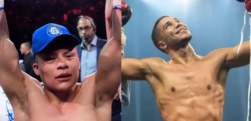 Deux boxeurs levant les bras après un combat