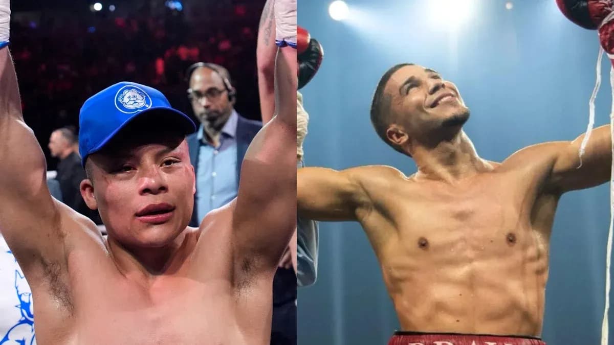 Deux boxeurs levant les bras après un combat