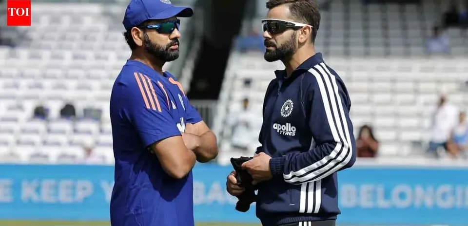 Rohit Sharma and Virat Kohli discussing on the field