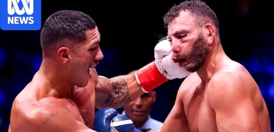 Boxer delivering a punch during a match