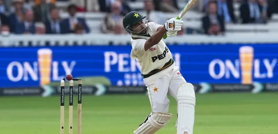 Batsman hitting ball during cricket match at Lord's