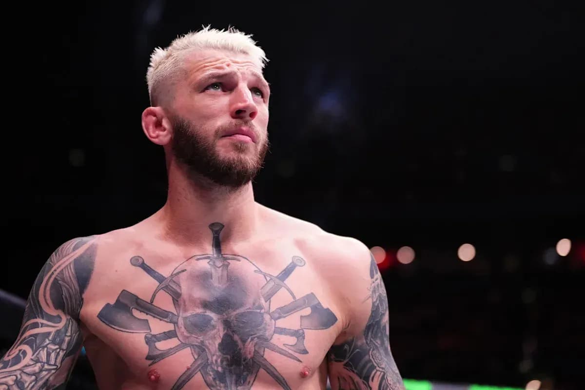 Fighter with tattoos preparing for match