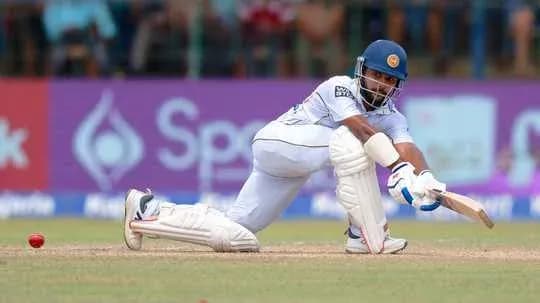 Batsman playing a defensive shot in cricket