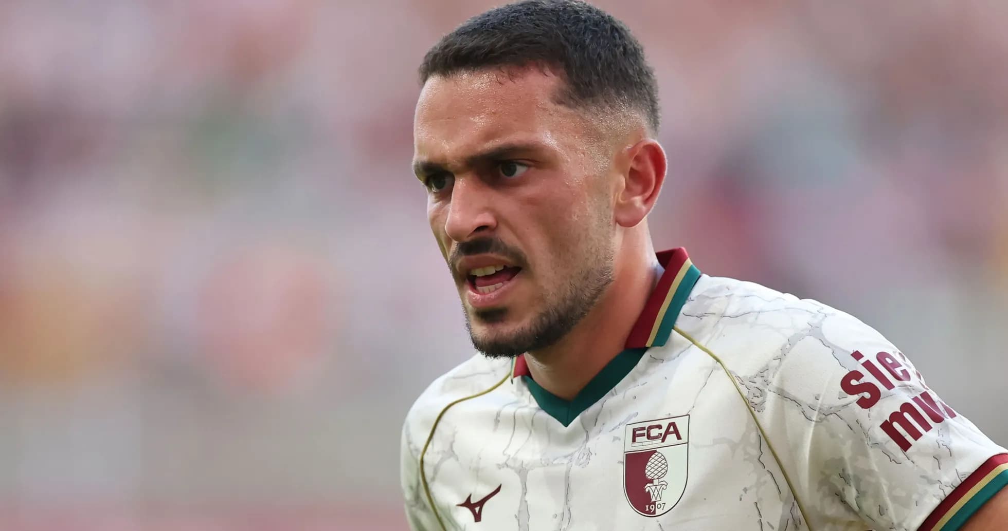 Joueur en maillot FCA lors d'un match