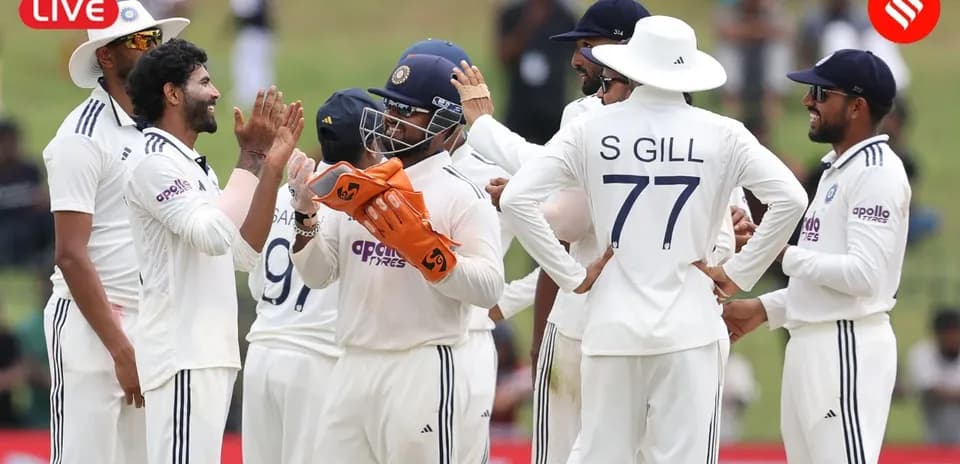 Joueurs indiens célébrant un wicket pendant un match