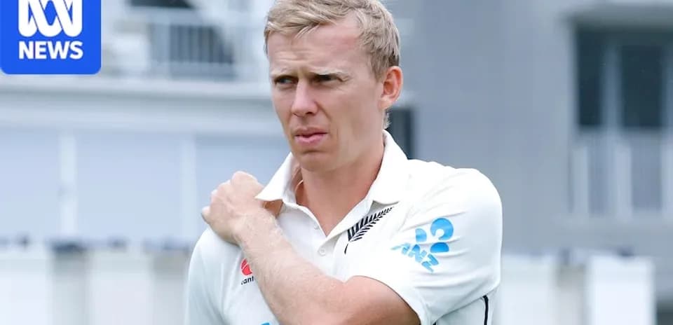 Joueur de cricket néo-zélandais touchant son épaule
