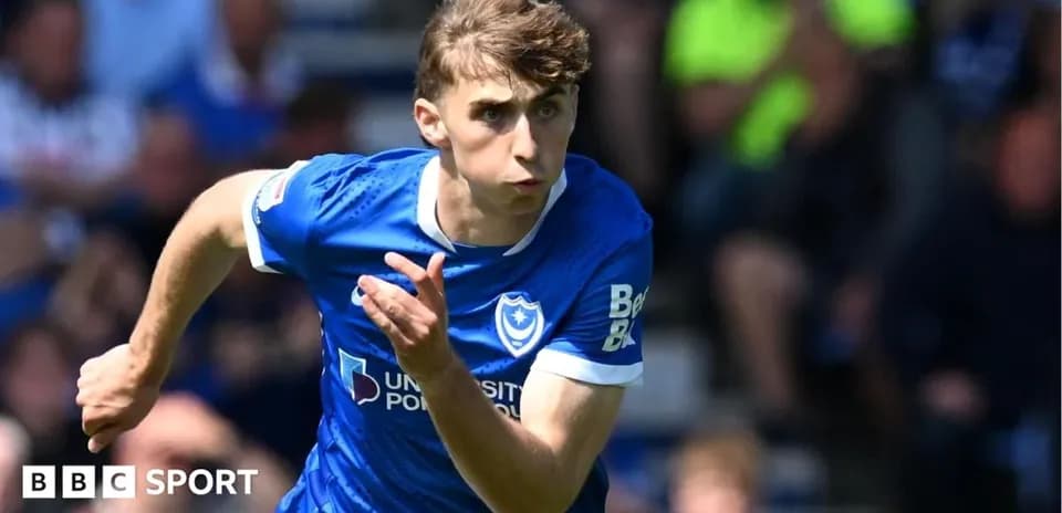 Joueur de Portsmouth courant sur le terrain