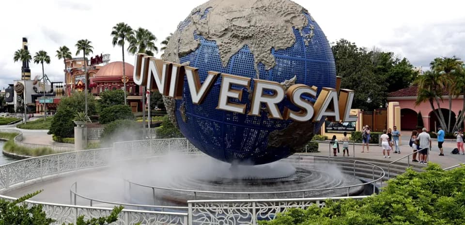 Globe monument with 'UNIVERSAL' at theme park entrance