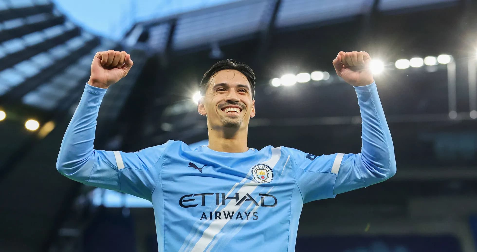 Joueur de Manchester City célébrant une victoire Joueur de Manchester City célébrant une victoire