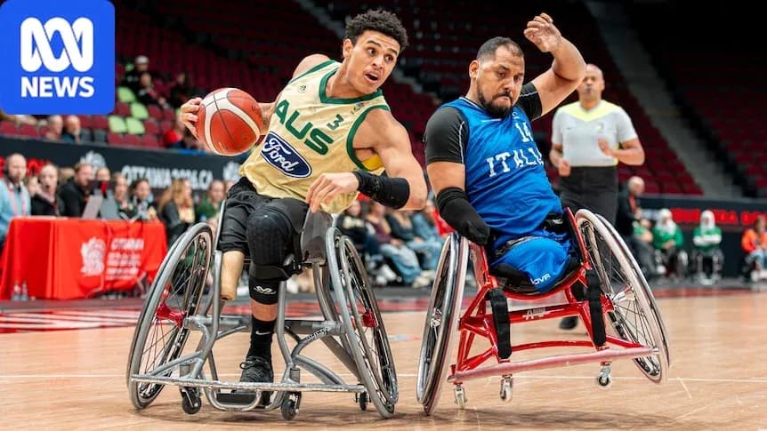 Joueurs en fauteuil roulant en action lors du match Joueurs en fauteuil roulant en action lors du match