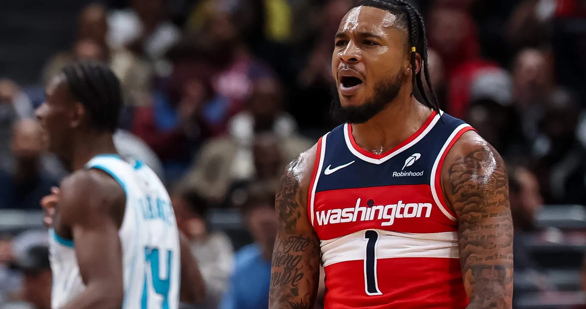 Joueur des Washington Wizards célébrant un point marqué Joueur des Washington Wizards célébrant un point marqué