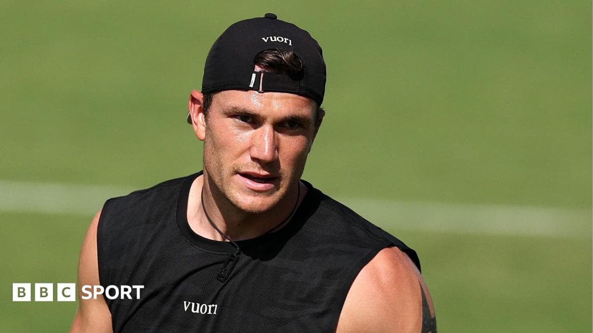 Athlete training on the field in black outfit Athlete training on the field in black outfit