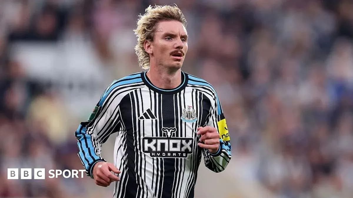 Joueur de Newcastle en action sur le terrain Joueur de Newcastle en action sur le terrain