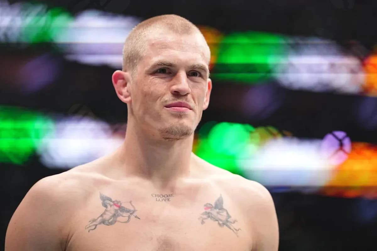 Fighter with tattoos posing before match Fighter with tattoos posing before match