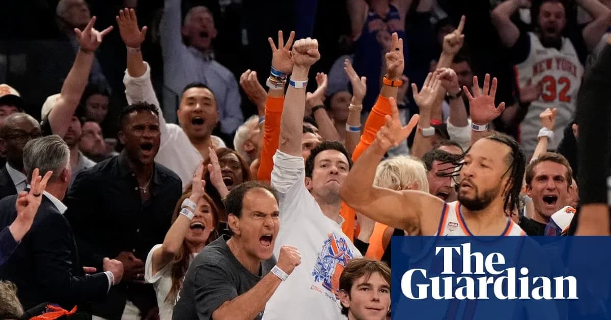 Spectators celebrating during a basketball game Spectators celebrating during a basketball game