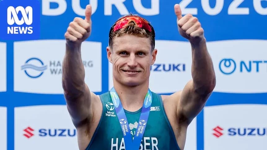 Athlete celebrating with thumbs up after competition Athlete celebrating with thumbs up after competition